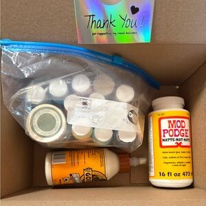 Assorted paints, Mod Podge Glue, Gorilla Glue for crafts.